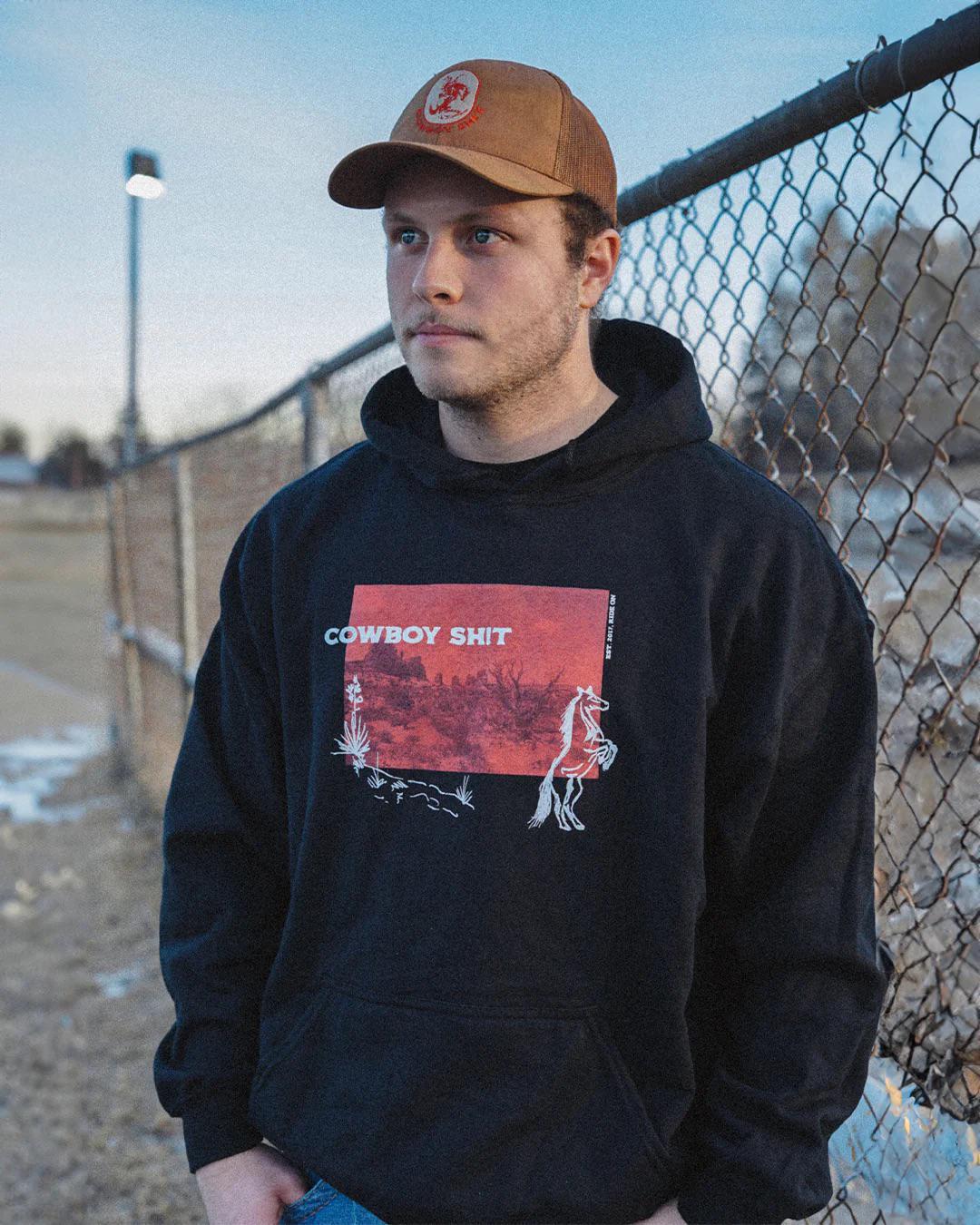 COWBOY SH*T UNISEX HOODIE DESERT IN BLACK